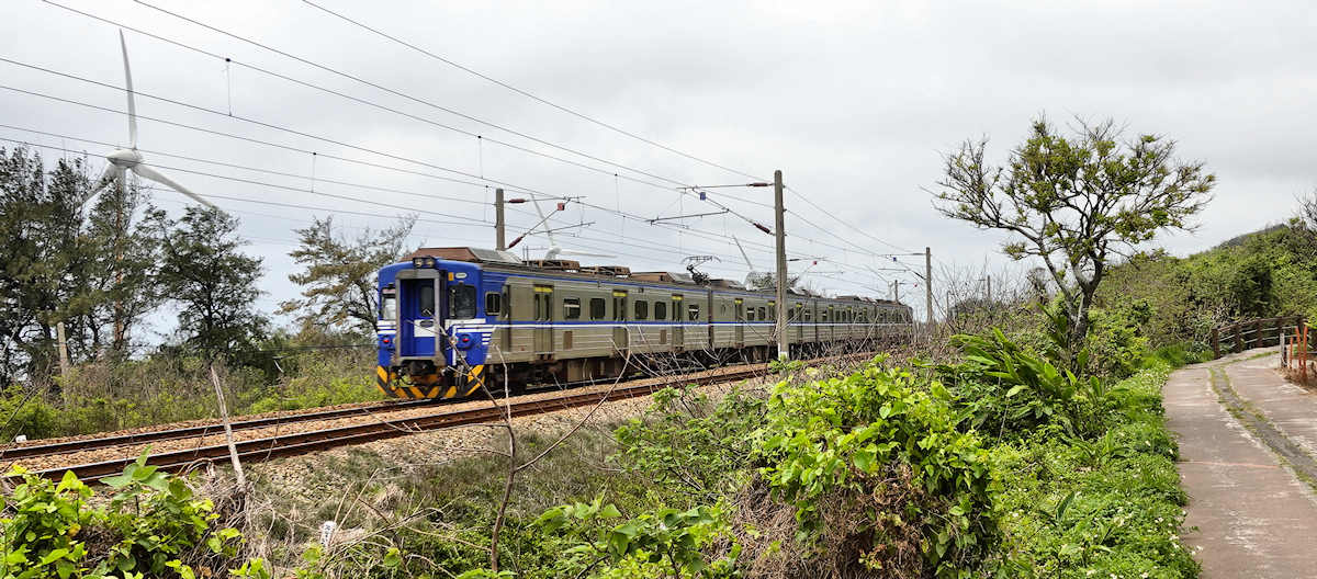 The local train on the coastal line next to the Bicycle Trail in BaiShaTun